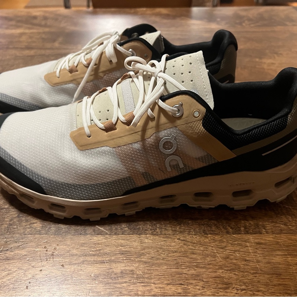On Running White and Tan Sneakers
